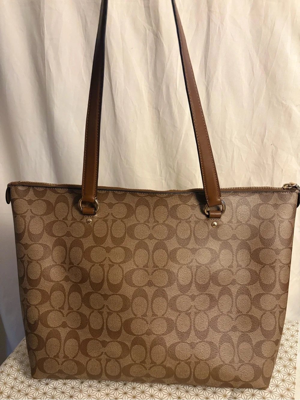 Coach zip logo